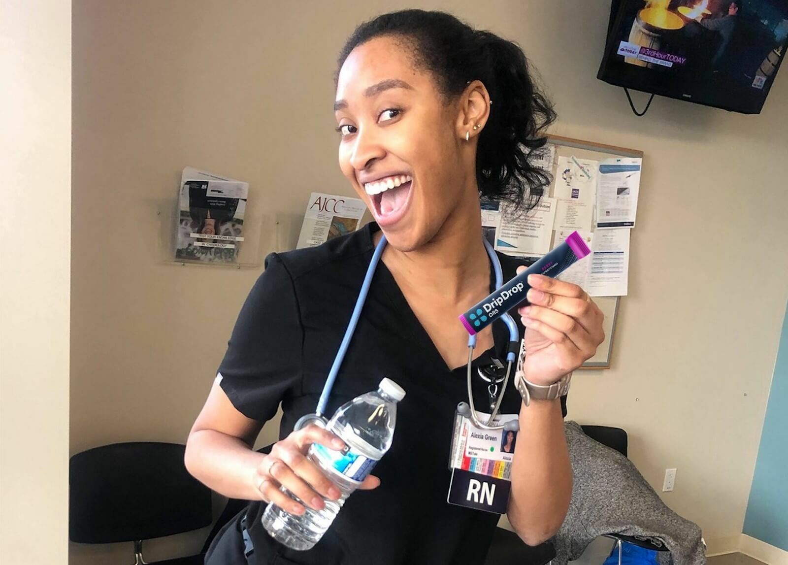 Medical worker holding DripDrop ORS sachet
